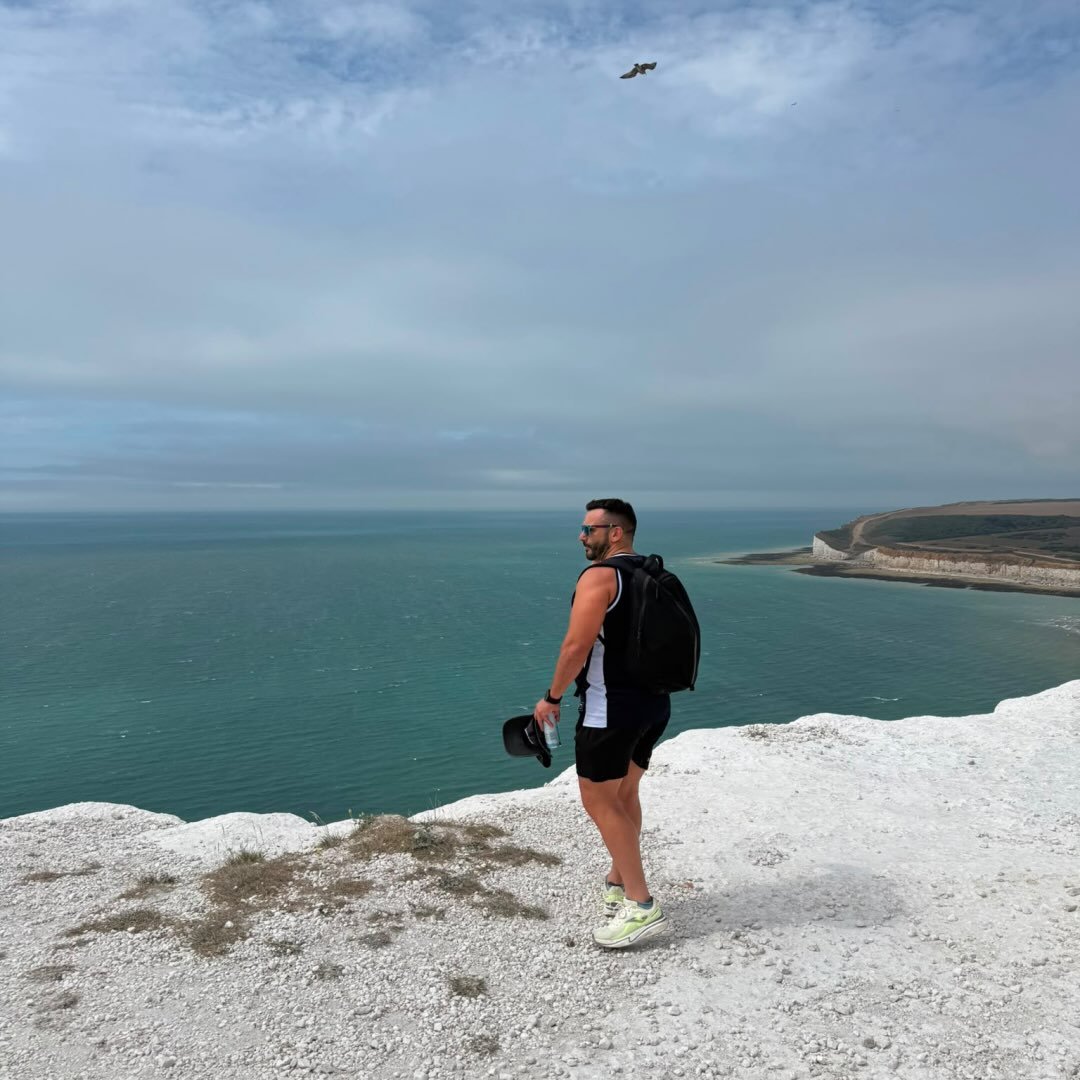 Saner Hasan overlooking the sea from a coastal path